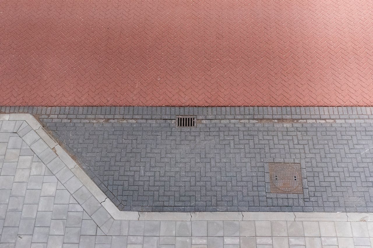 Home Overhead shot showing diverse paving patterns in vibrant colors.
